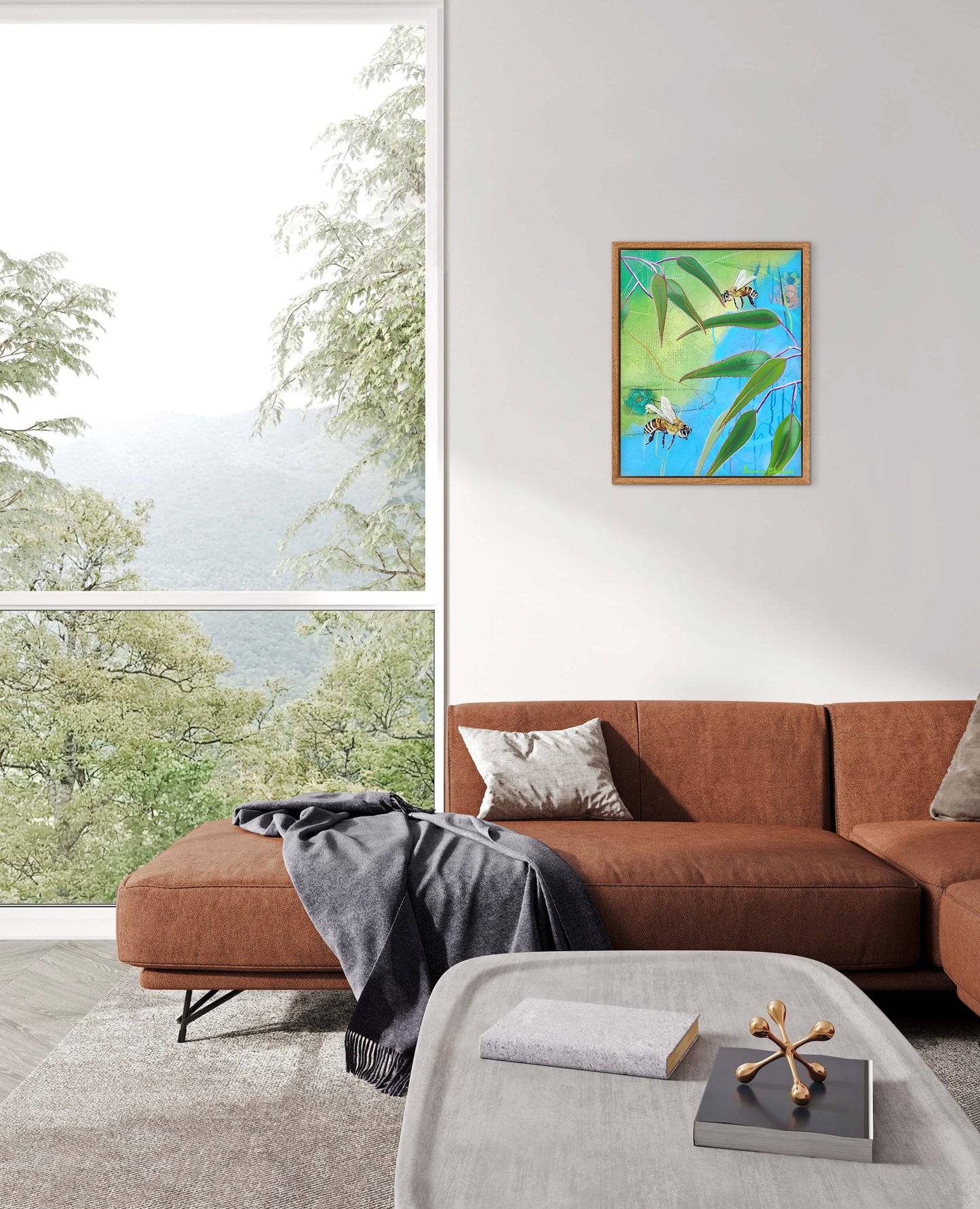 Living room with a brown sectional sofa, gray coffee table, and a painting of bees on a leaf.