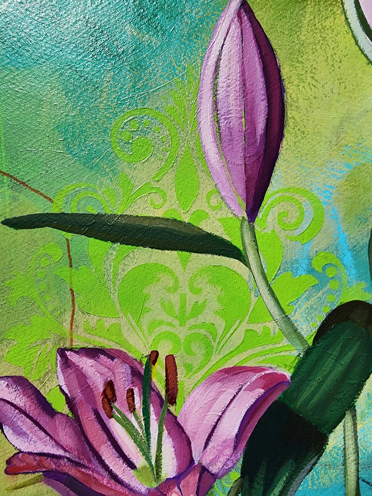 Close-up of a pink flower with green leaves on a textured green and blue background