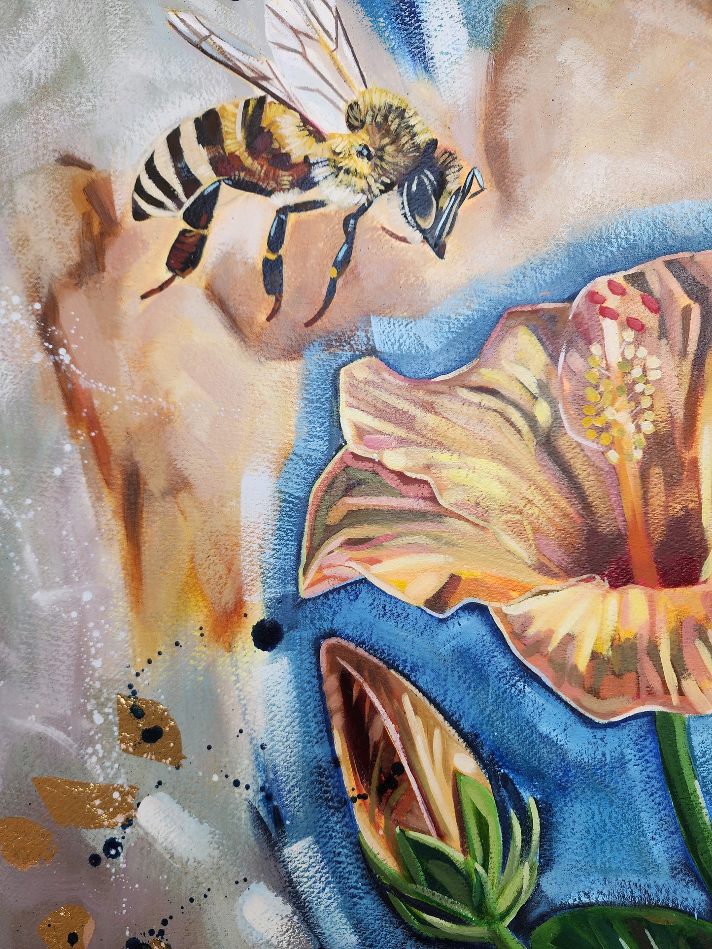 Close- up of bee and orange hibiscus flower