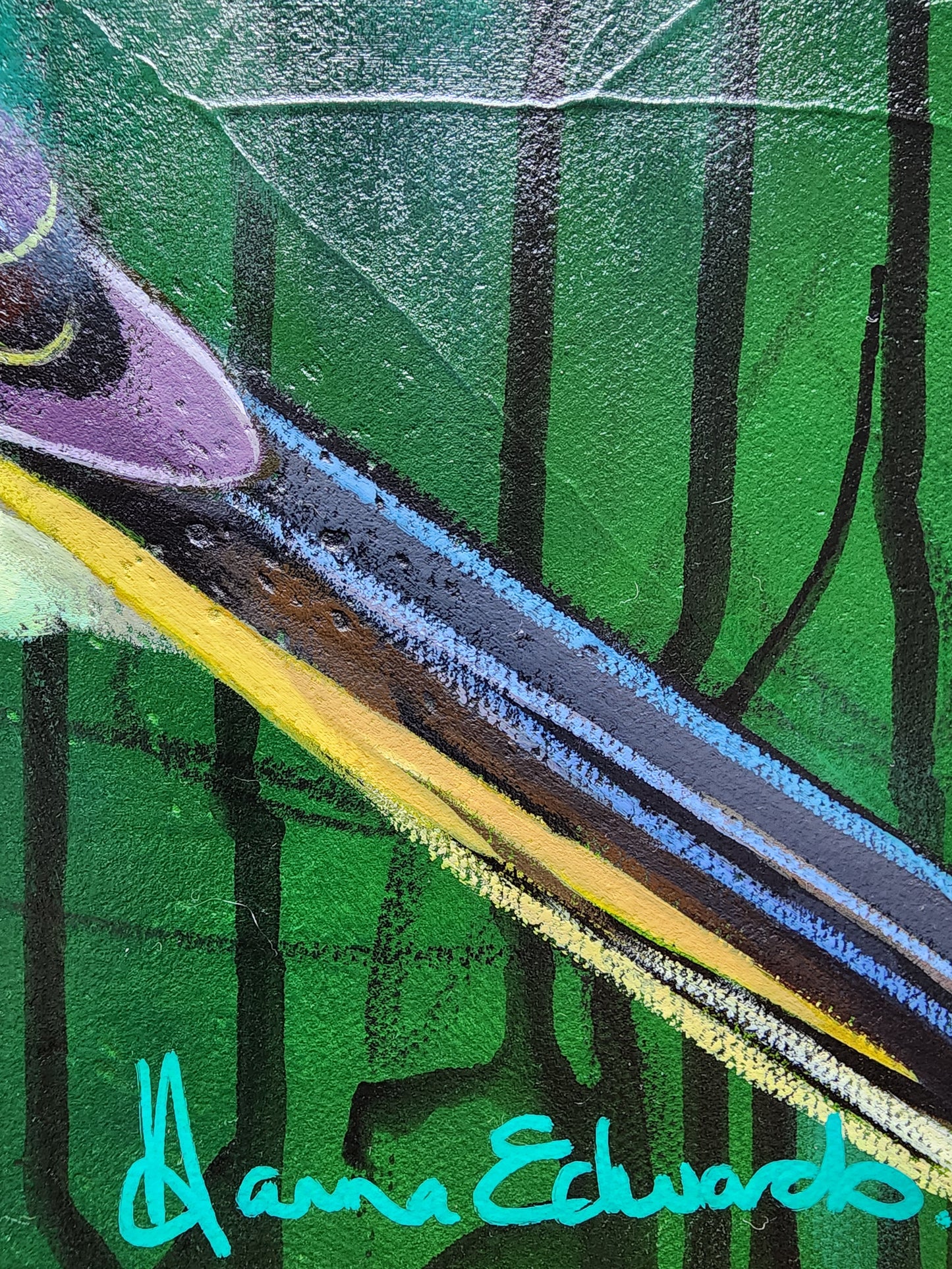 Close-up of birds tail feather on a green background with artist signature Hanna Edwards