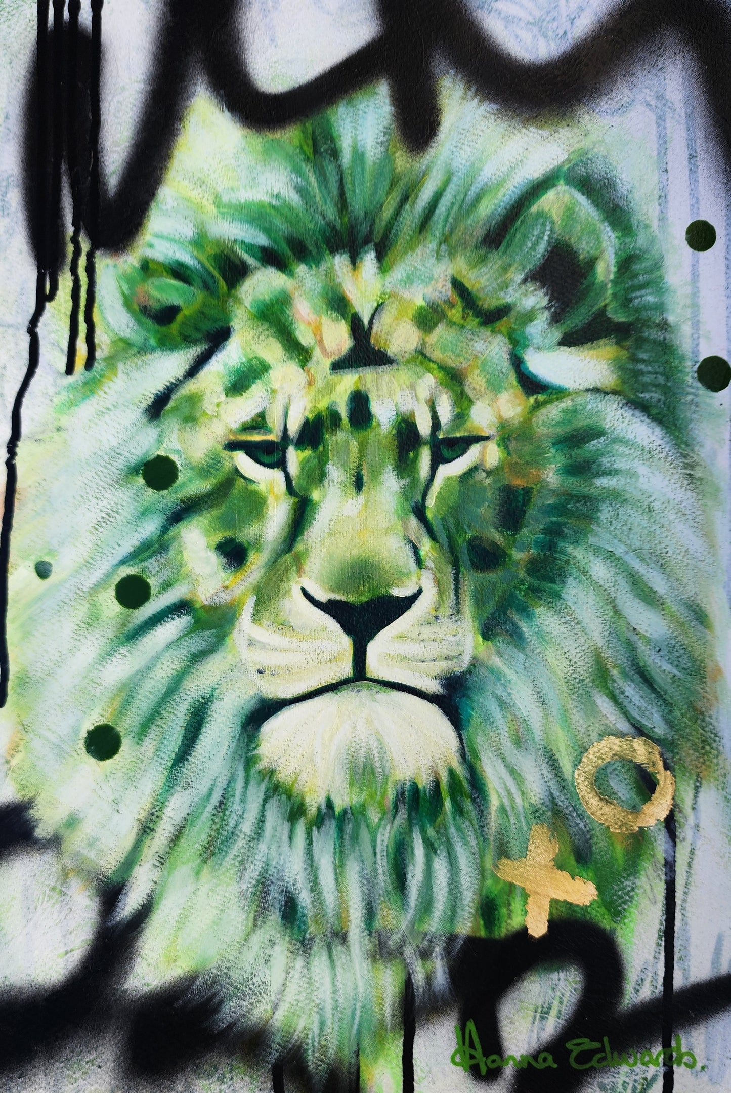 Green lion with black grafitti