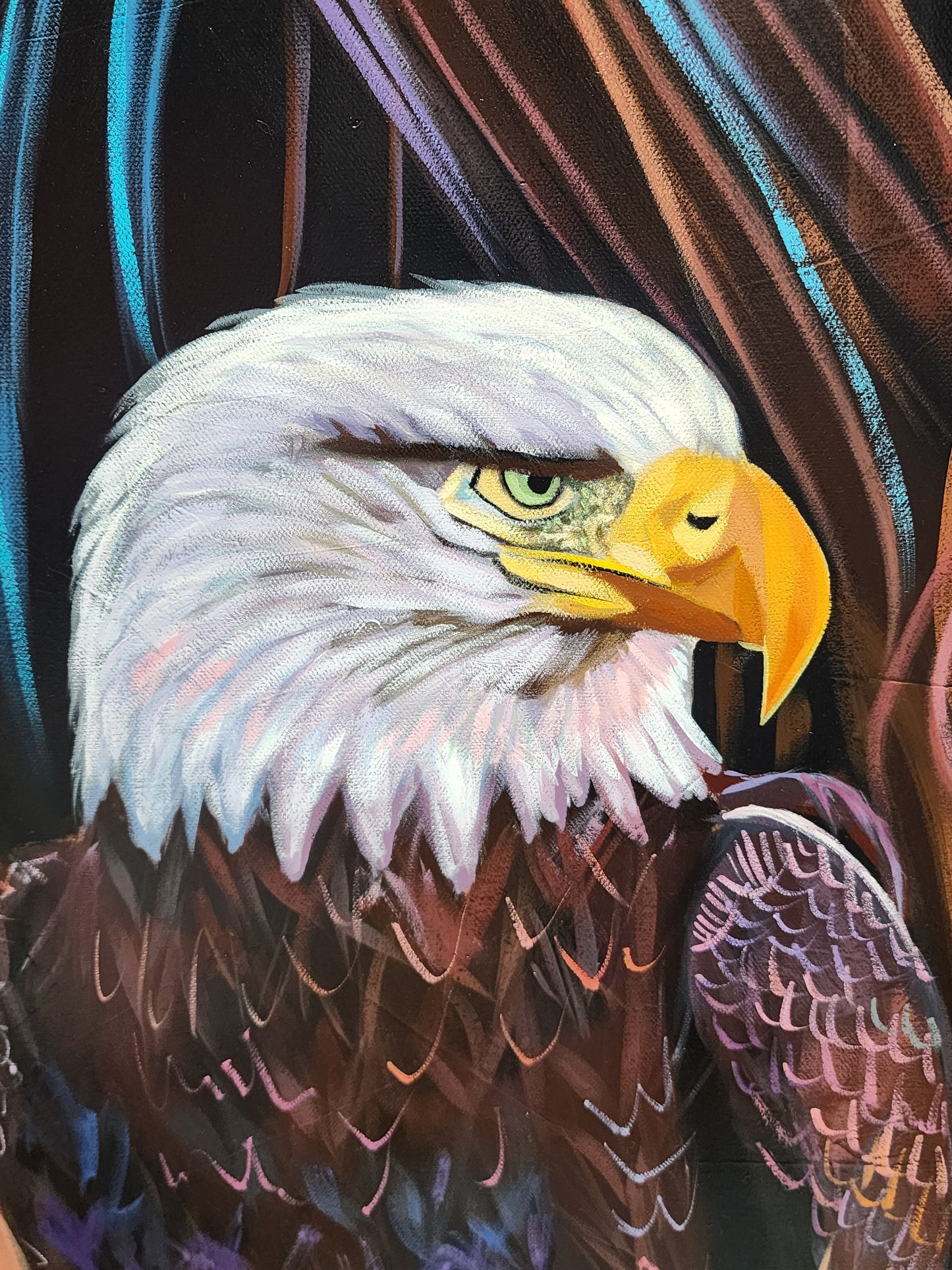 A close-up painted portrait of a bald eagle with white feathers, a yellow beak, and a dark brown body against a dark background with blue and brown streaks.