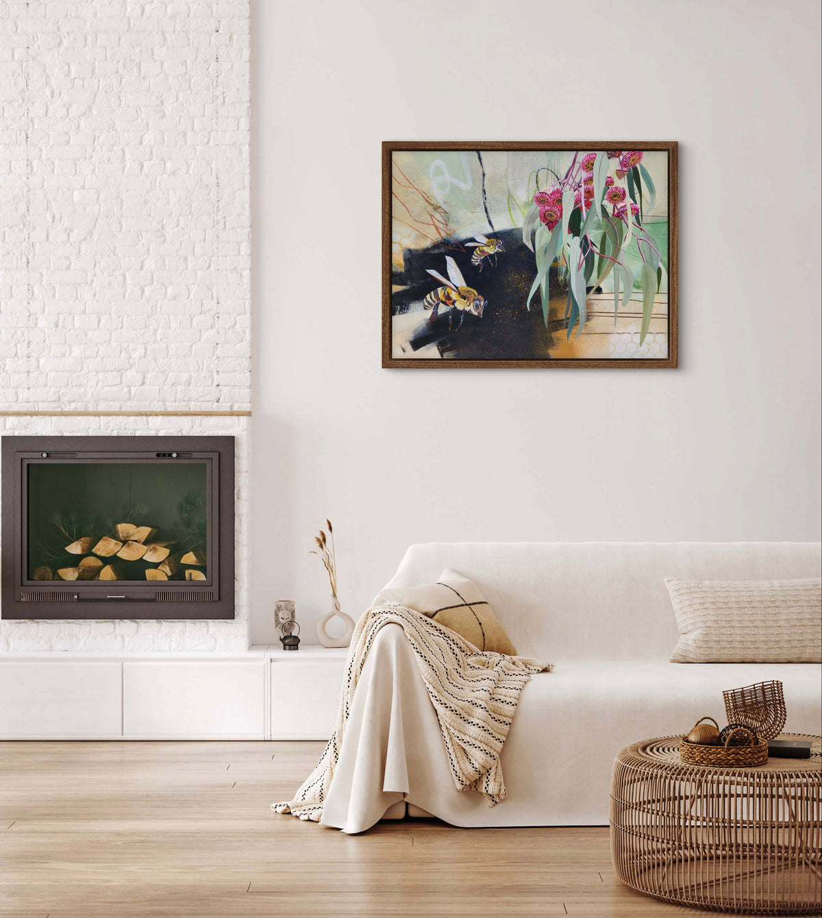 Beauty in the small things is a bee and gum leaf painting by Australian artist Hanna Edwardson diplay in modern interior