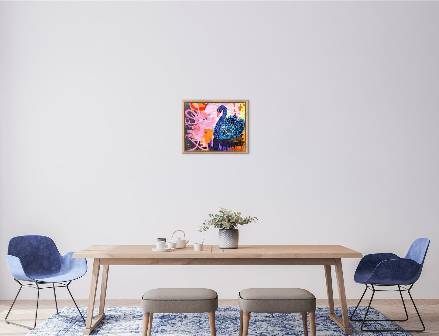 Dining room with a table, chairs, and a colorful abstract painting on the wall.