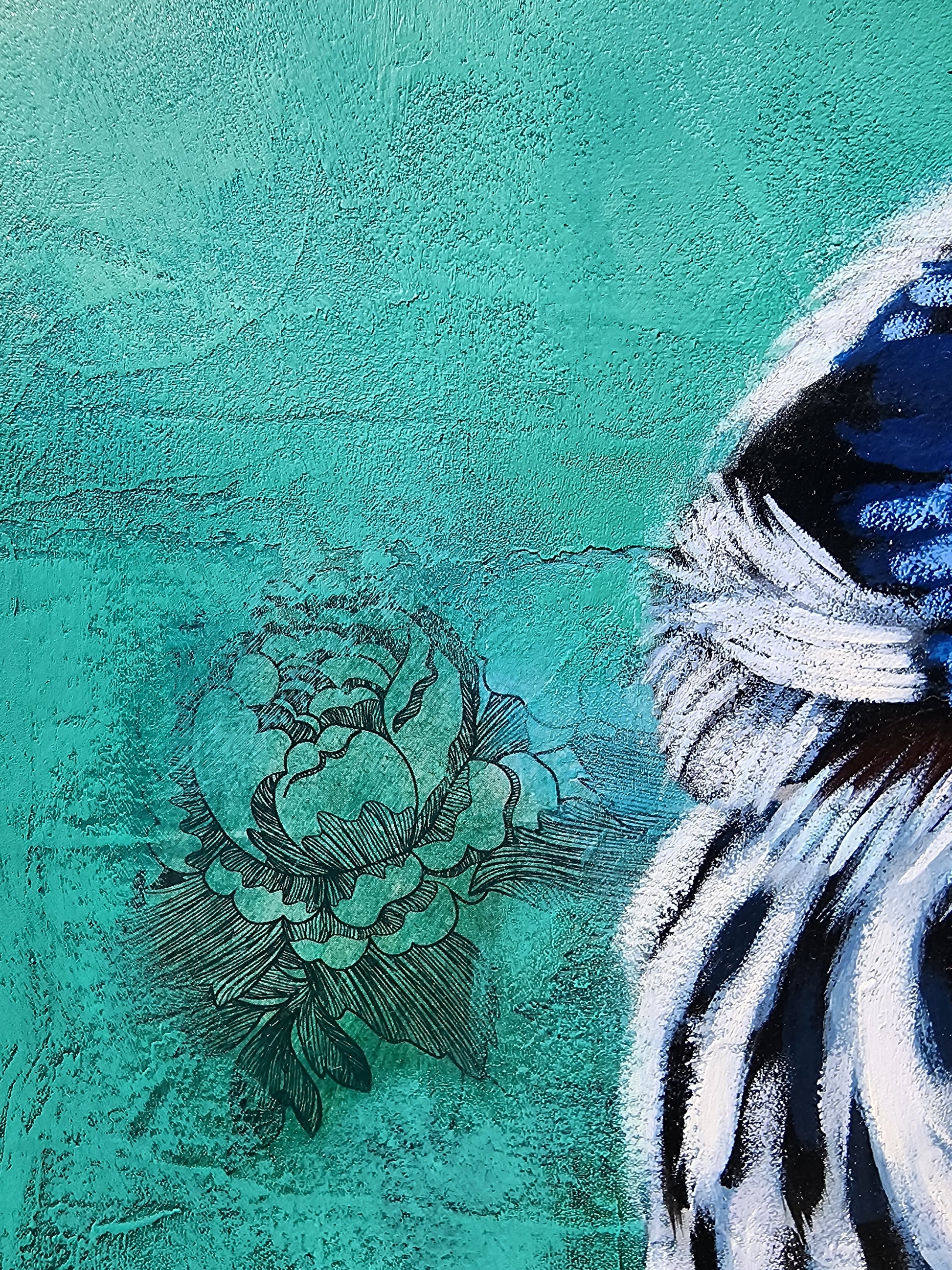 Close - up  textured teal background with floral elements