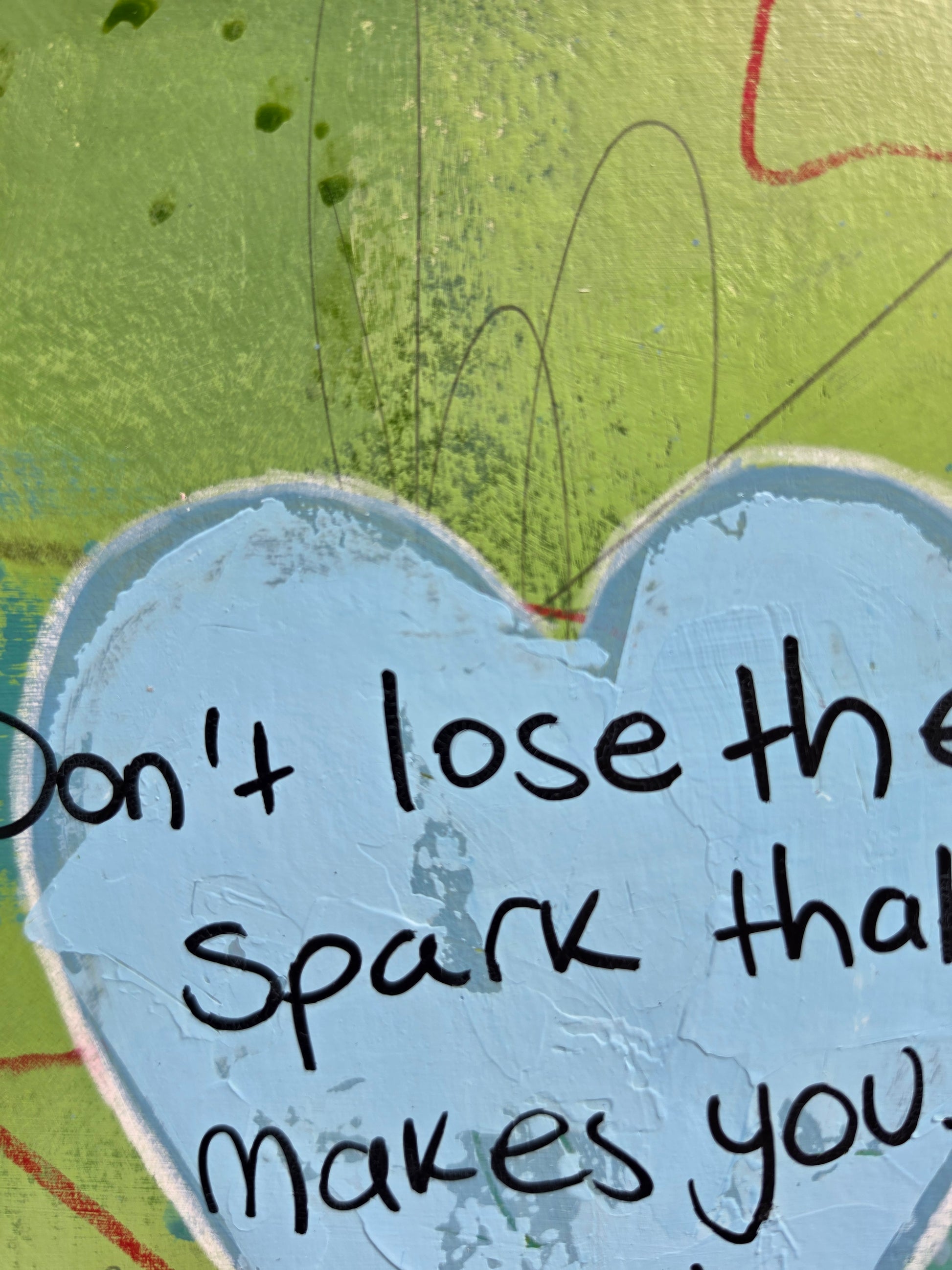 Blue heart texture with text on a green background