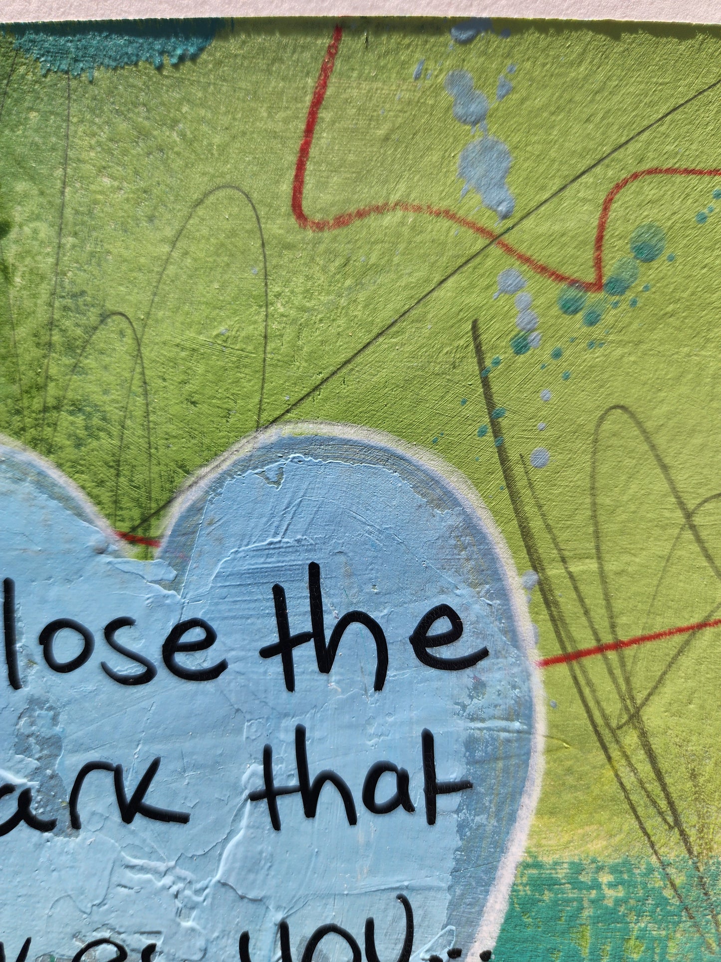 Artistic depiction of a heart with text on a textured green background
