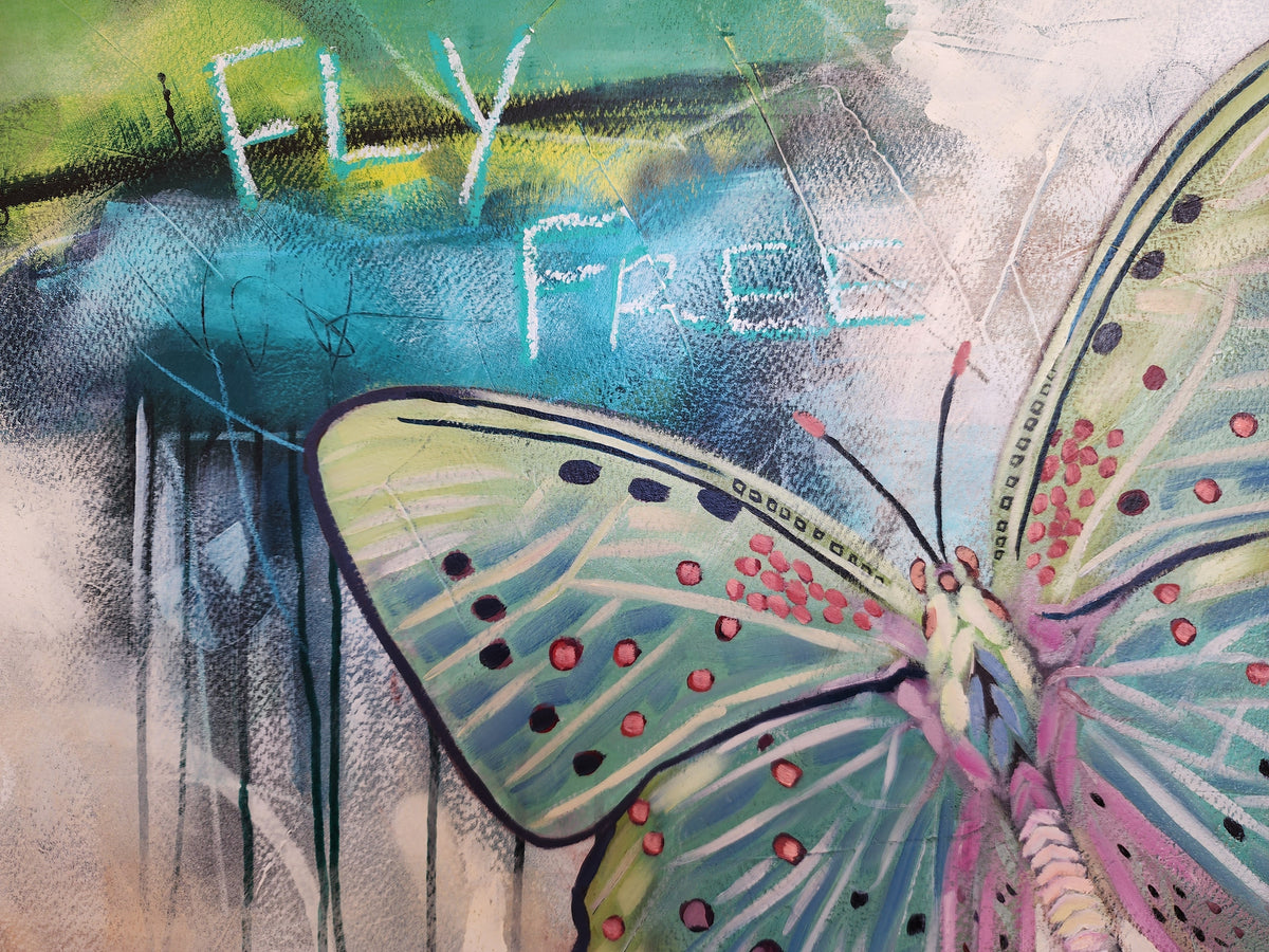Fly Free butterfly artwork in blue, green and pink by Australian artist Hanna Edwards, with expressive marks and layered texture close up.