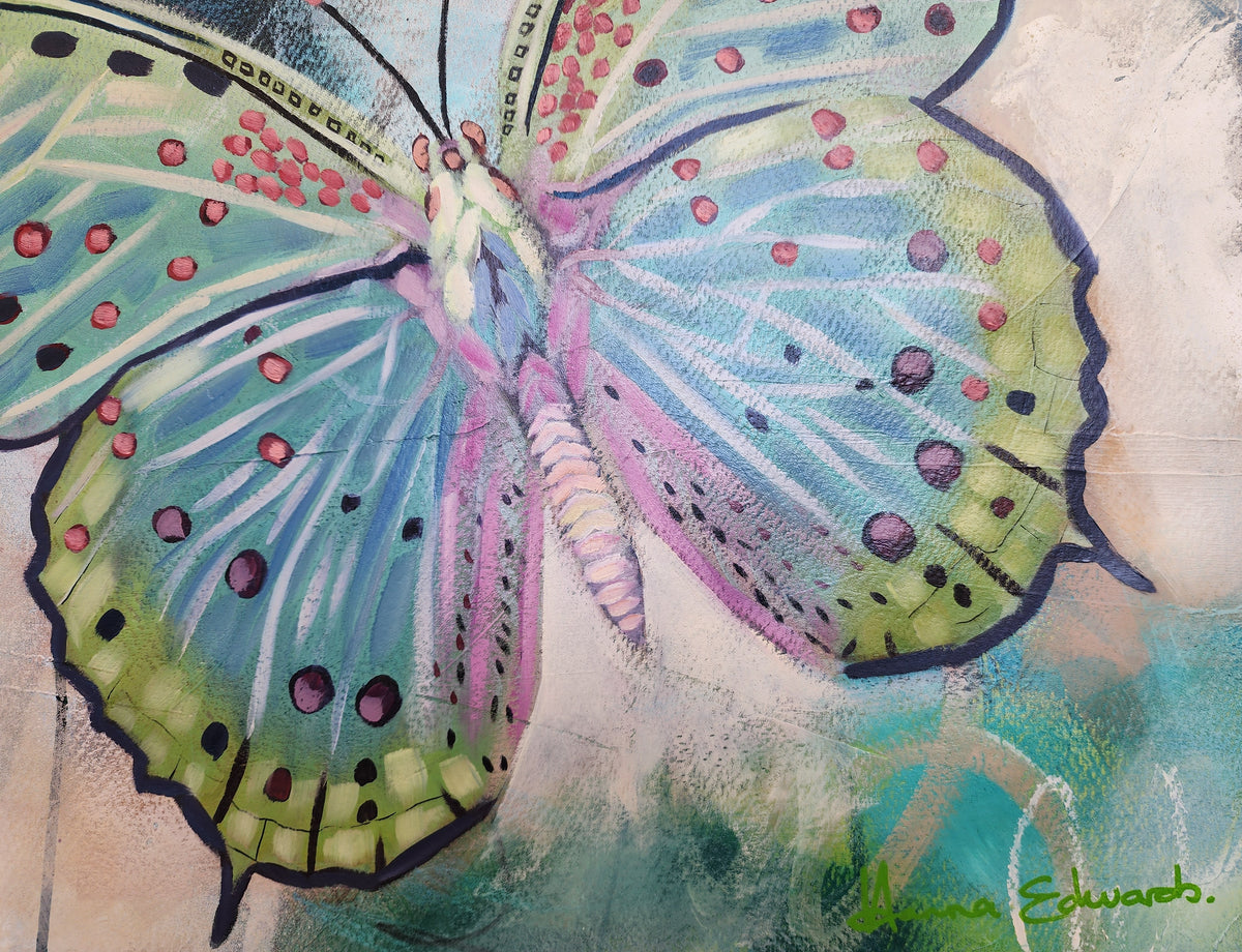 Fly Free butterfly artwork in blue, green and pink by Australian artist Hanna Edwards, with expressive marks and layered texture and artist signature in green.