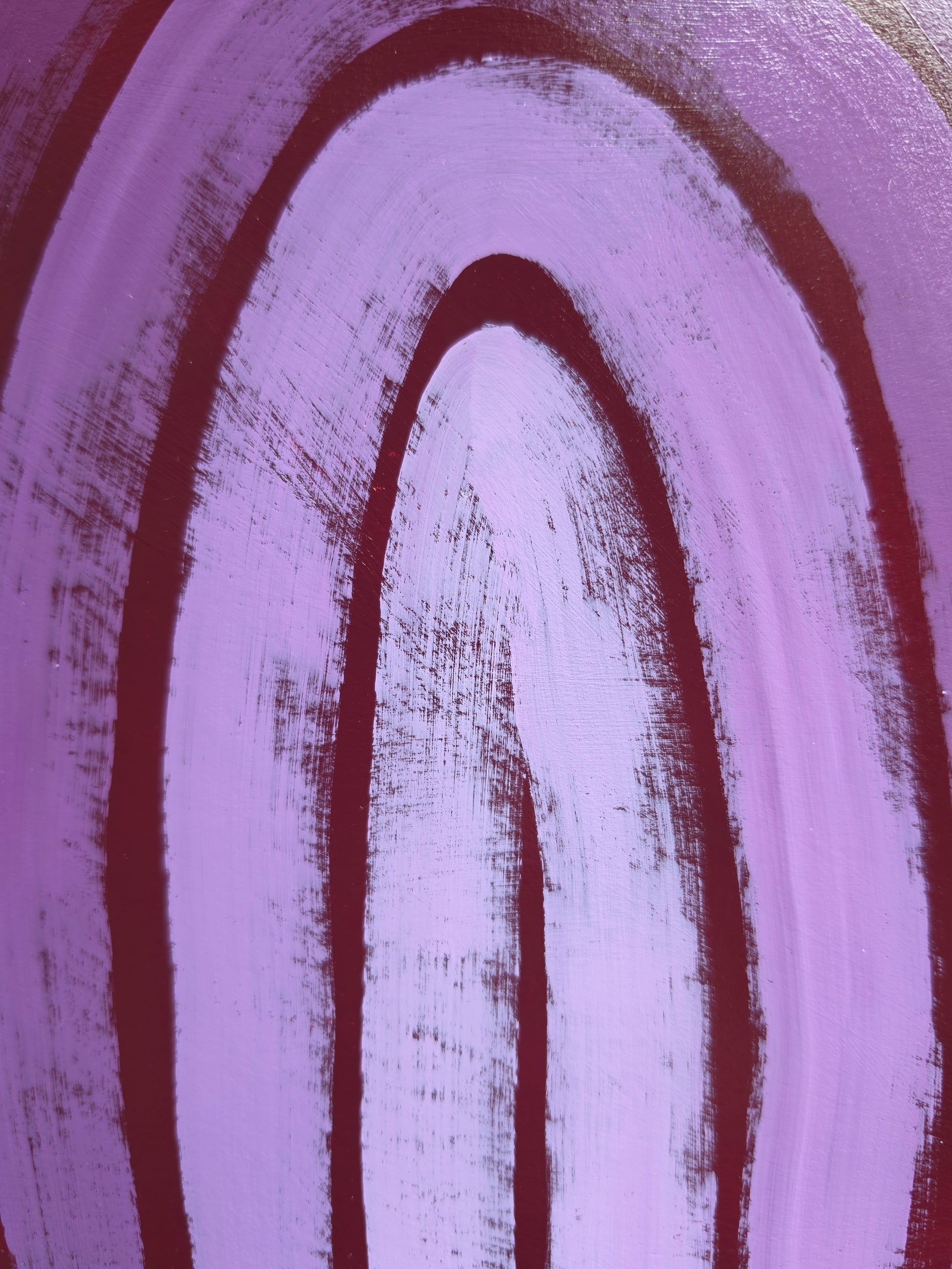 close up of monochromatic  purple rainbow on purple/red background