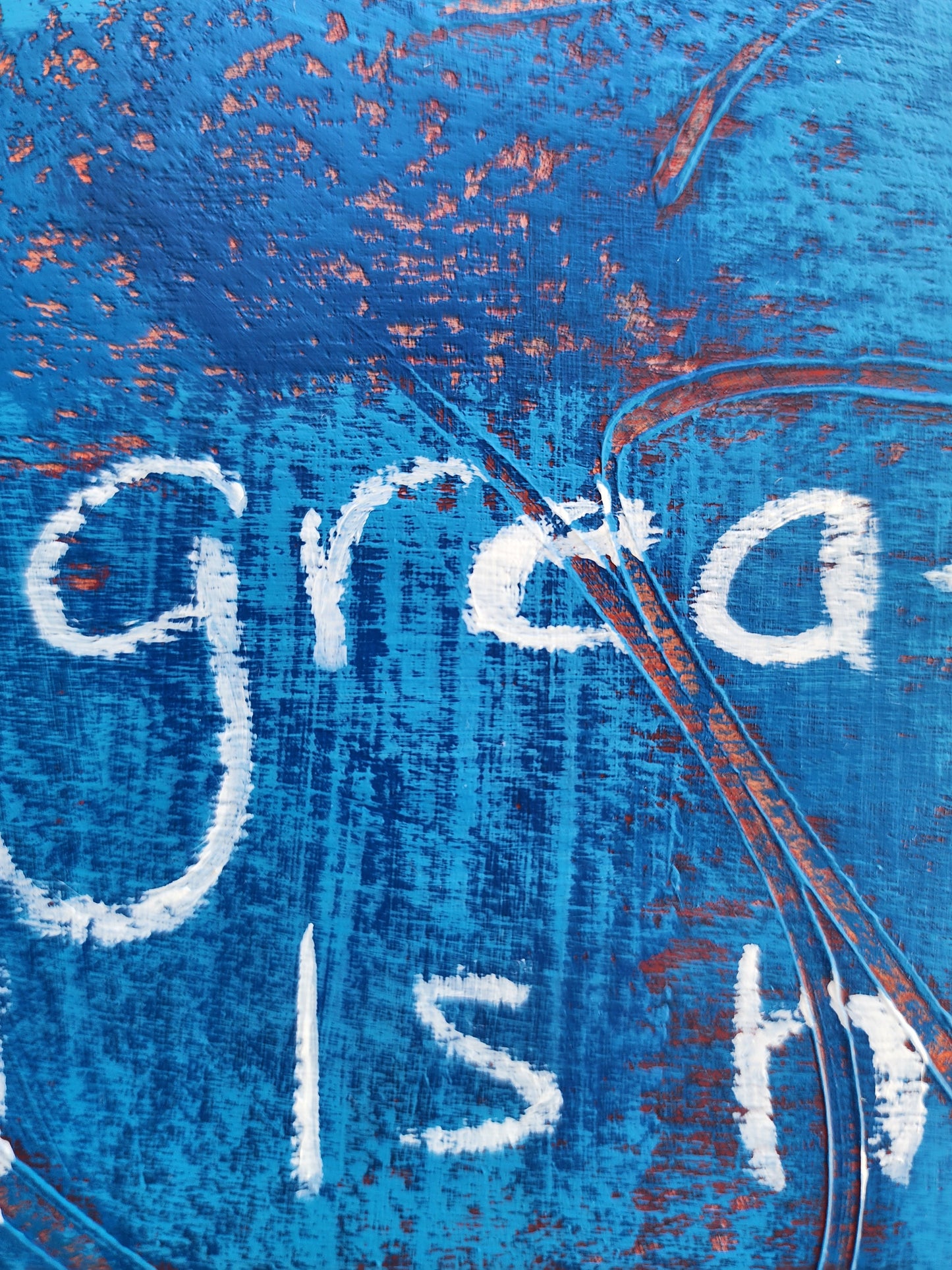 Close up of painting on a textured blue background