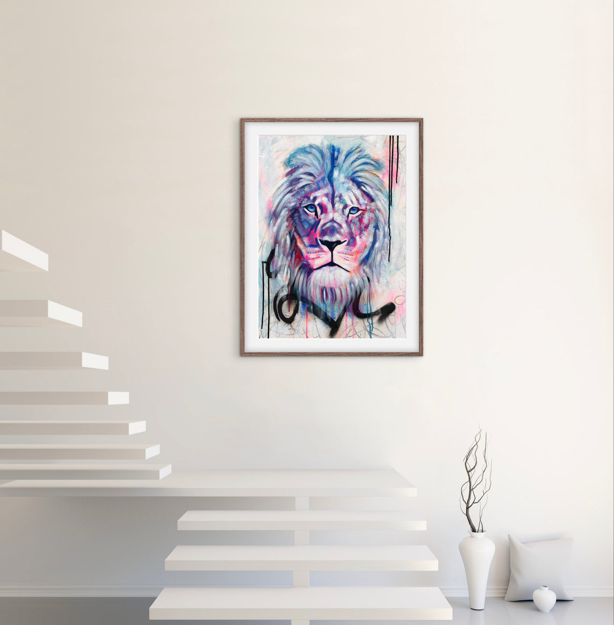 Unapologetically Me lion painting by Australian artist Hanna Edwards, featuring a colourful lion with expressive blue and pink marks and drips. Displayed in modern interior.