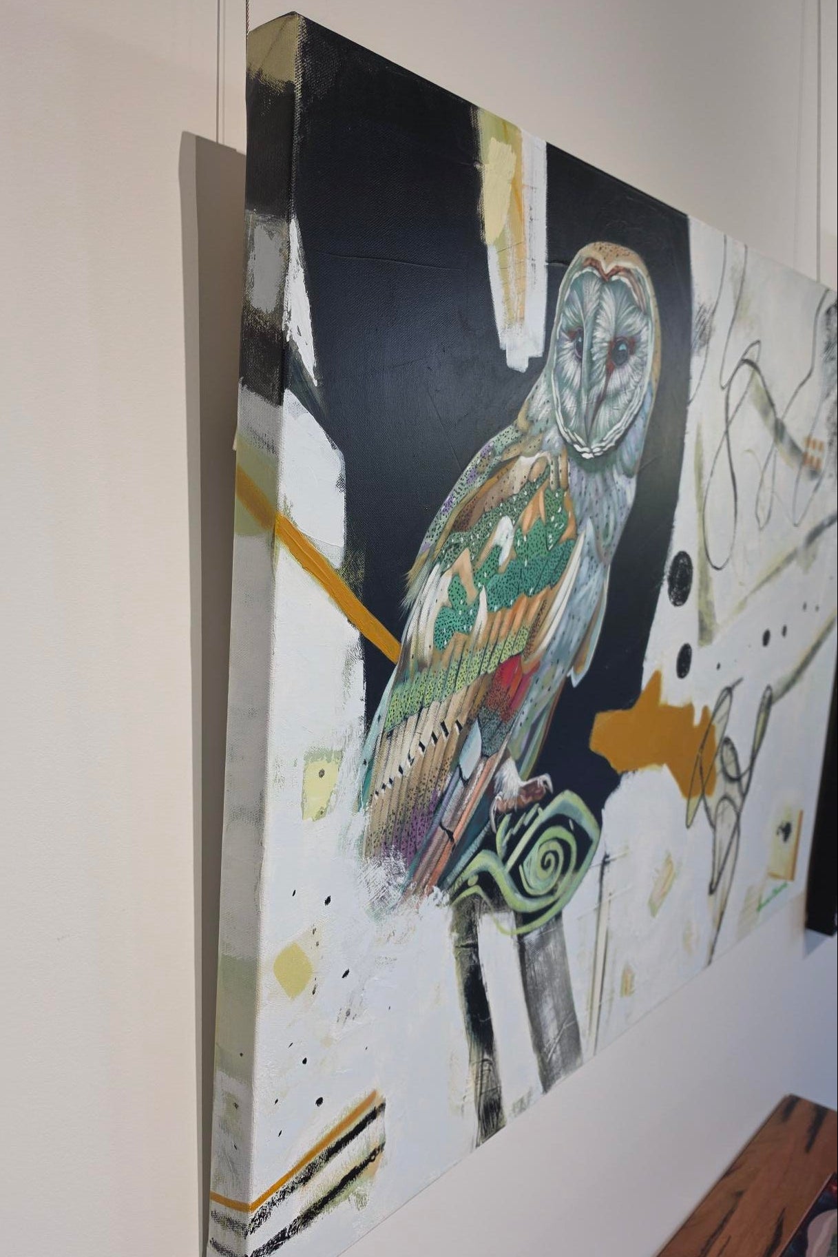 Side view of owl painting
