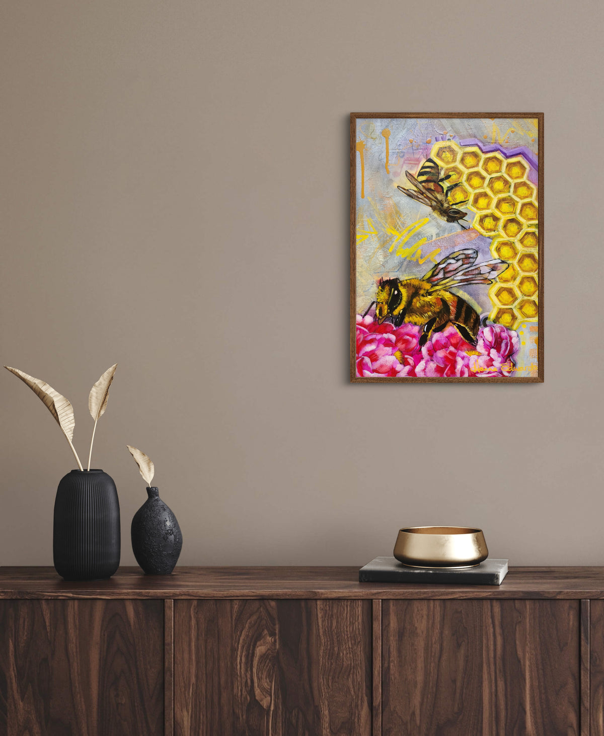 Colourful mixed media painting of bees, honeycomb and pink flowers by Australian artist Hanna Edwards on display modern interior.