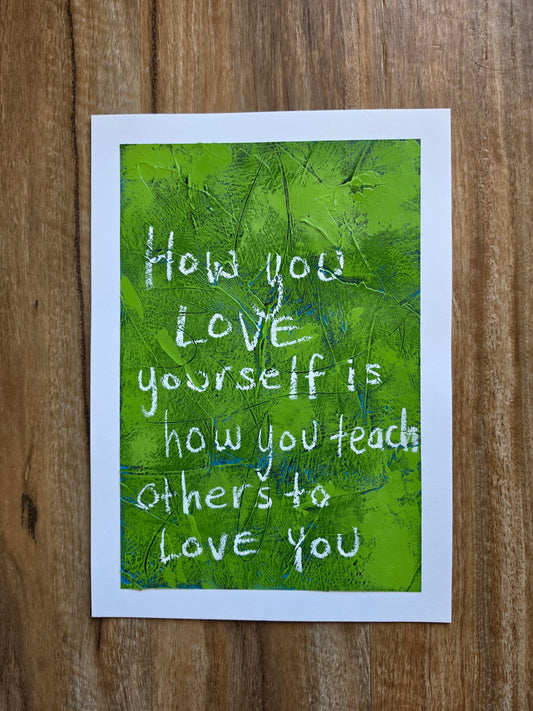 Abstract painting heavily textured in green with pops of teal and blue popping through with the words How you love yourself is how you teach others to love you in white handwriting