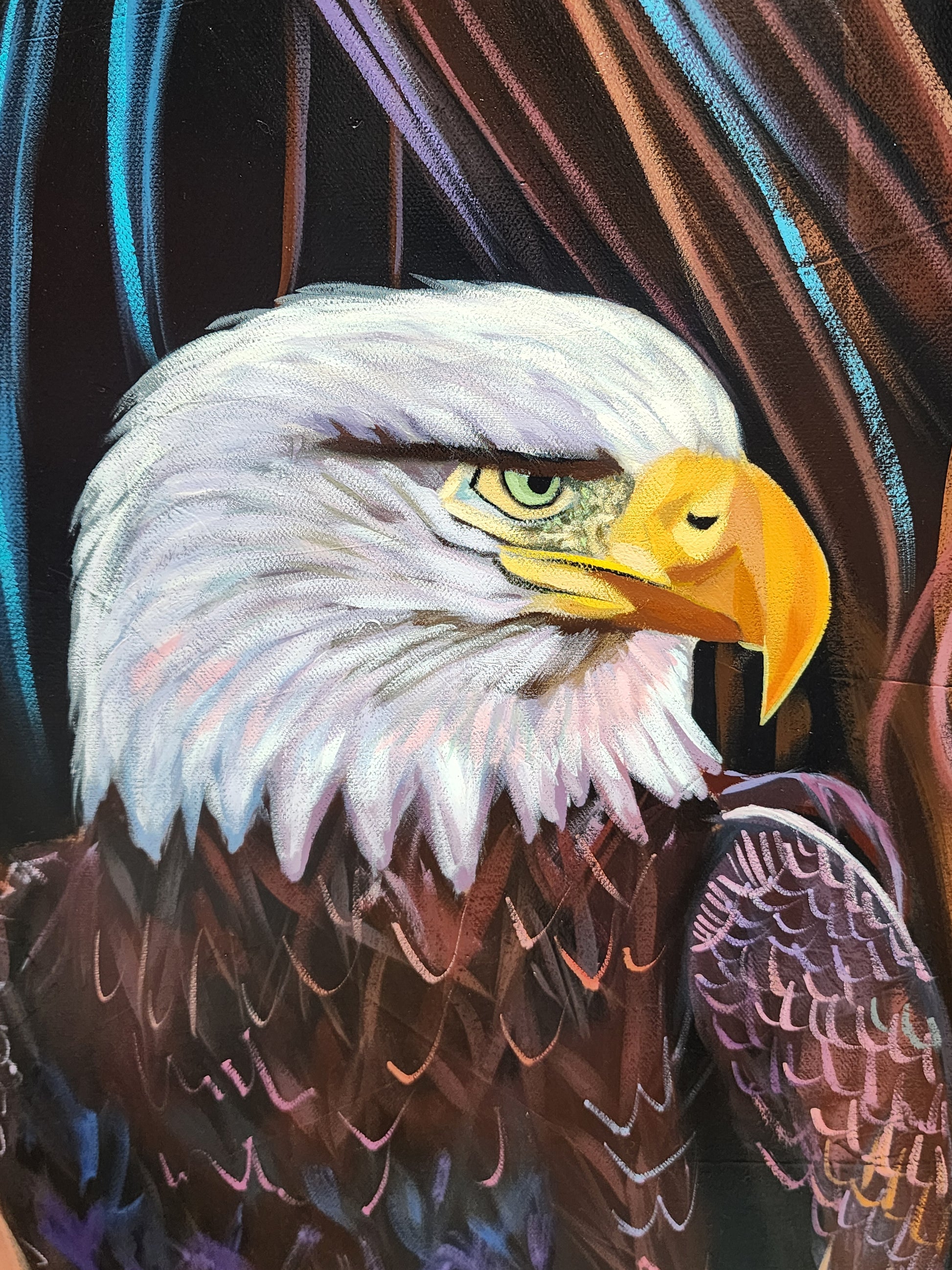 A close-up painted portrait of a bald eagle with white feathers, a yellow beak, and a dark brown body against a dark background with blue and brown streaks.